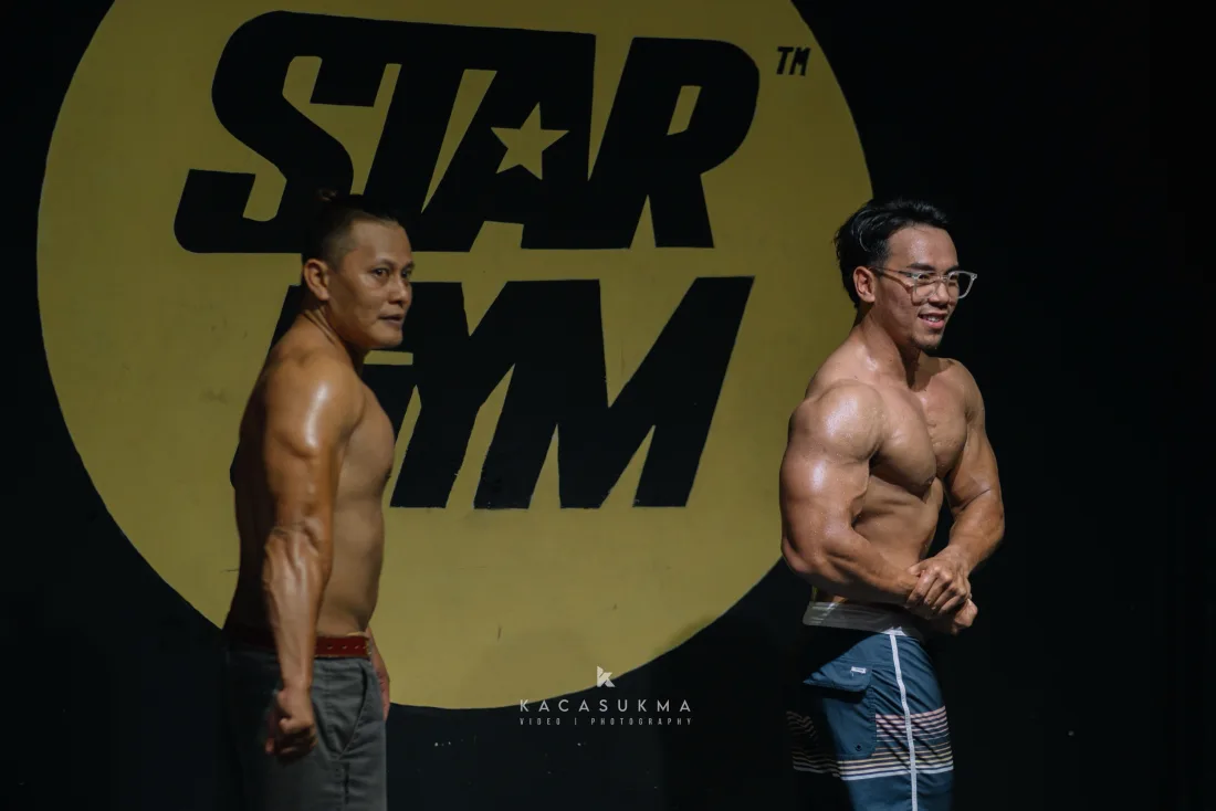Competitor posing on stage